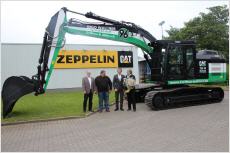 Hannover96 Bagger Übergabe bei Zeppelin CAT Hannover